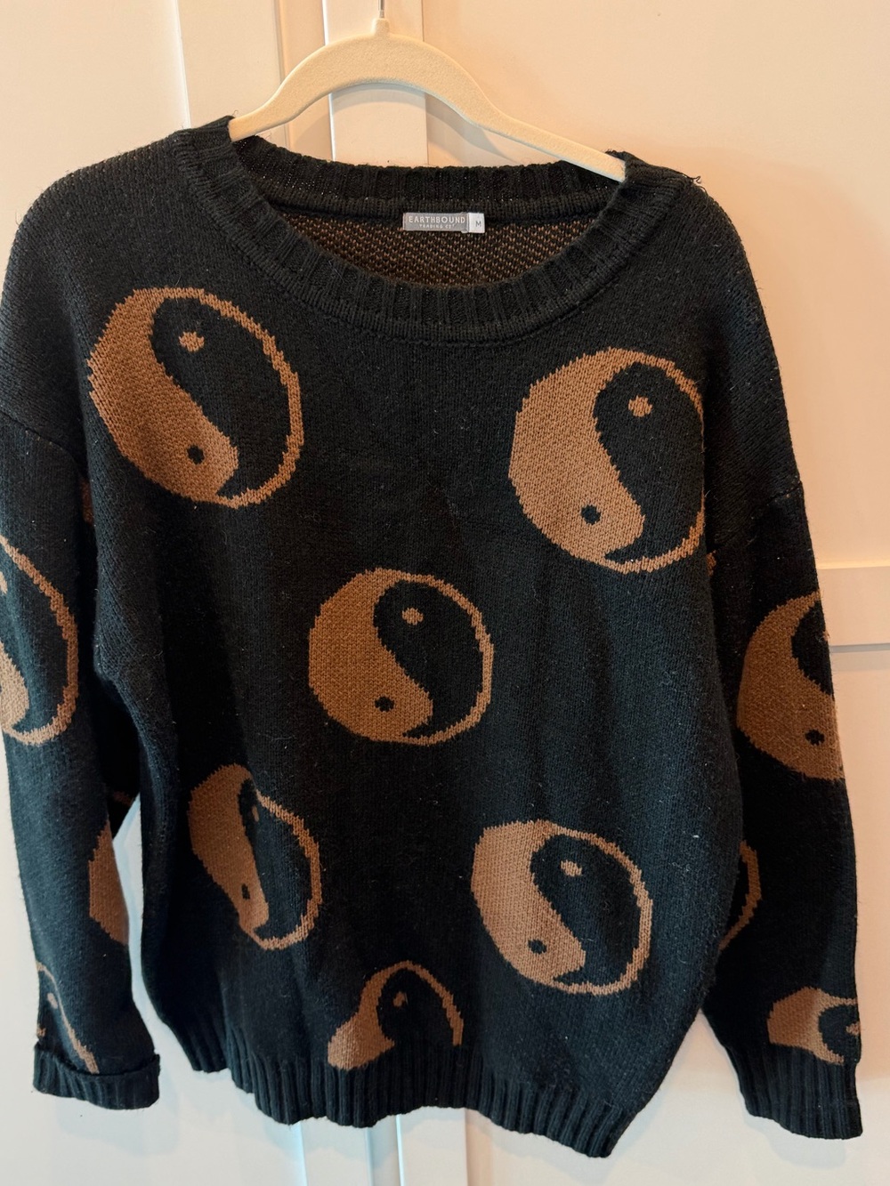 EARTHBOUND Black Crewneck Sweater with Brown Yin-Yang Motif